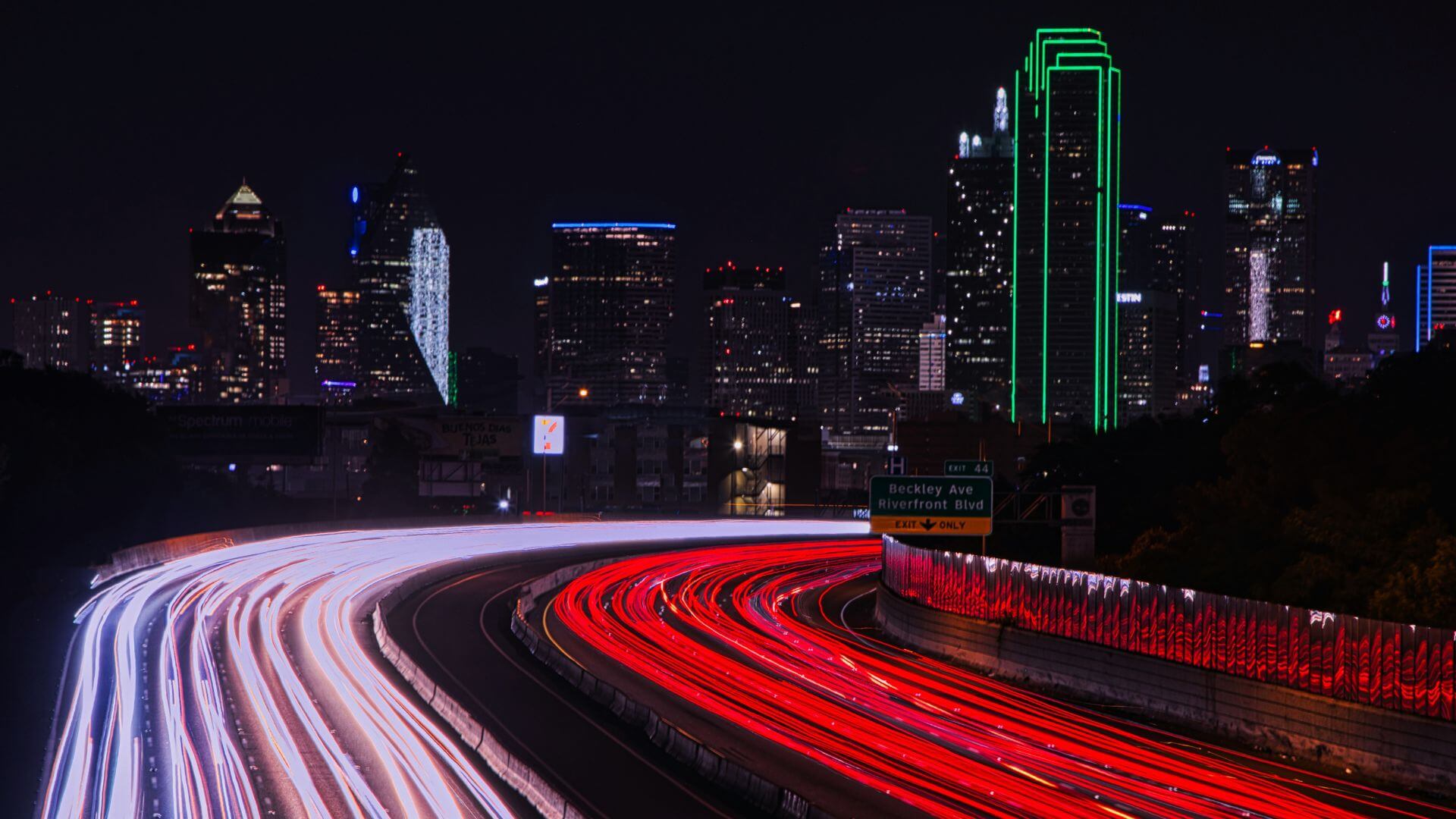 Dallas freeway and skyline at night during a Dallas lifestyle weekend